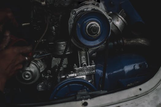 Detailed view of an old car engine showcasing mechanical intricacies, located in Johannesburg.